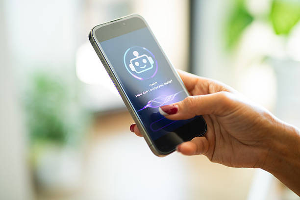 istock Woman using her smartphone to ask AI chatbot questions. 2220484366