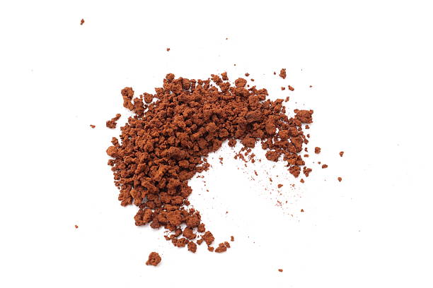 istock Finely ground roasted coffee, coffee powder isolated on white background 2220488476