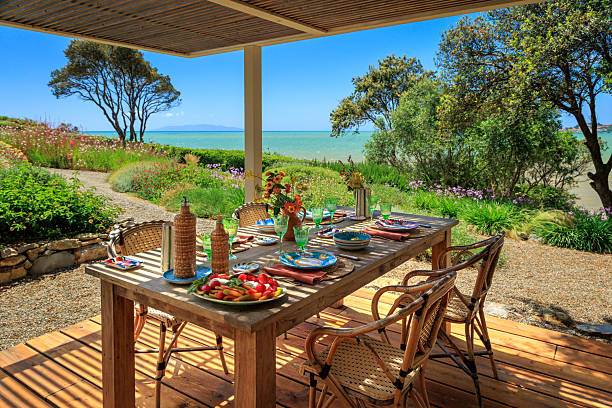 istock Dining table terrace in Italian garden with sea view 2220489235