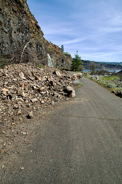 Highway partially blocked by fallen rock after an avalanche