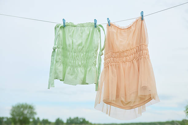 istock Summer dresses hanging on a clothesline 2220491223