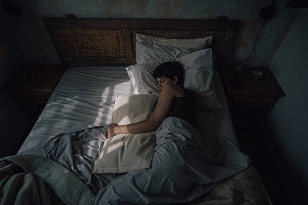 istock A woman sleeping in the morning 2220496138