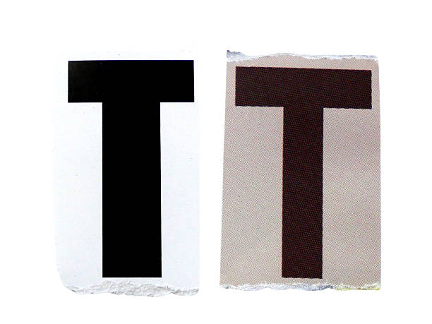 istock T wording or text with pieces of torn or cut paper, design elements isolated on white background with clipping path. 2220496370