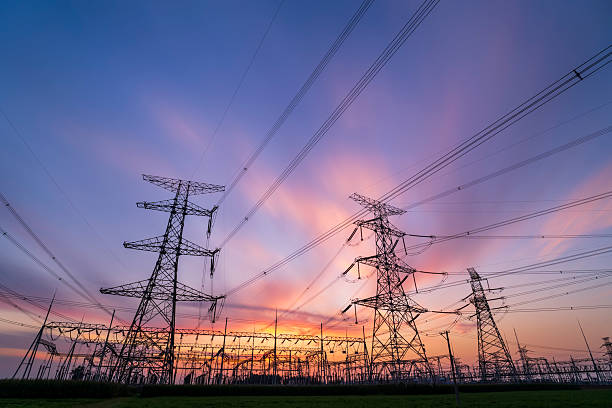 istock Pylons, high voltage pylons in the evening 2220497245