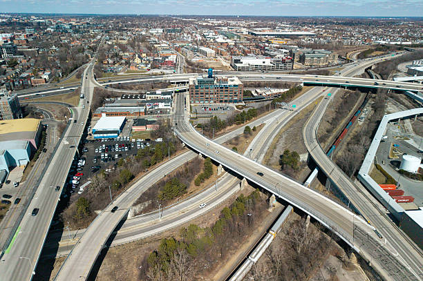 Columbus Ohio Interchange and Rail Road Tracks - Train Passing by - Wide Shot