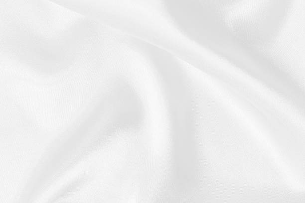 istock White fabric texture for background and design, beautiful pattern of silk or linen. 2220500621