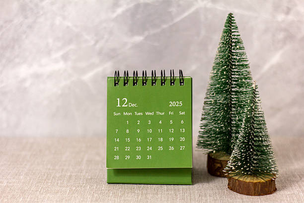 istock Hello, December 2025. Desktop calendar for planning on a gray background. 2220503718