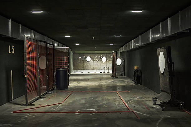 istock Empty Indoor Shooting Range with Targets Awaiting Club Participants 2220504663