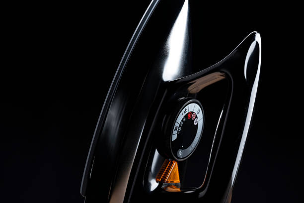 istock Close-Up of Iron Placed Against Black Background 2220514879