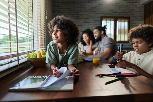 istock Small black kids having a creative time at home. 2220515188