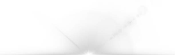 istock Bright sunbeams and glowing lens flares create a vibrant, fantasy-like summer scene with transparent 2220515725