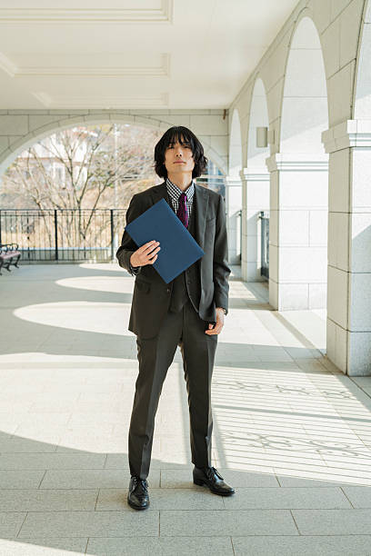 istock Graduation ceremony for male college students 2220516111