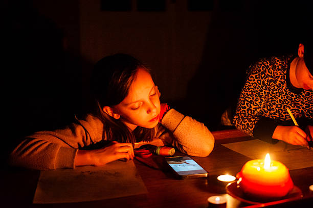 istock Children draw during a power outage 2220517046
