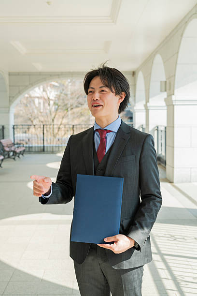 istock Graduation ceremony for male college students 2220518828