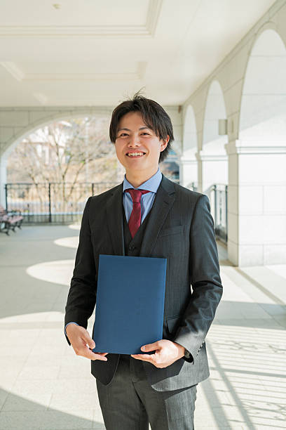 istock Graduation ceremony for male college students 2220519243