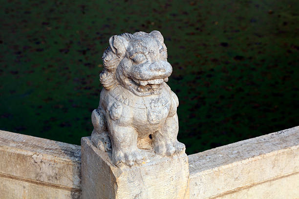 Ancient Chinese stone lion sculpture