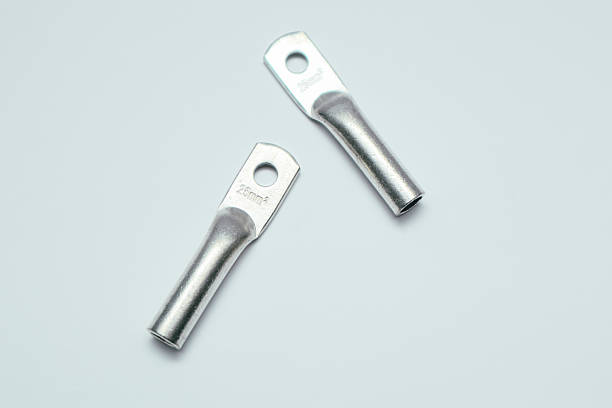 istock Closed-end ring terminal. Crimp terminals for electrical wires, tools for electricians. electrical terminal, electronic work on white 2220521380