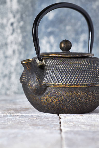 istock Japanese Cast Iron Teapot on bright background. 2220526101