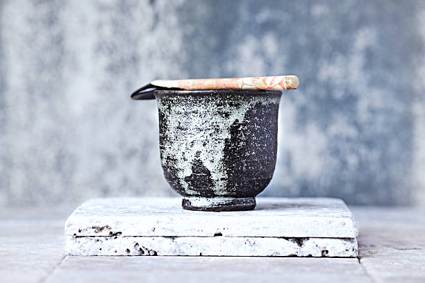 istock Tea culture. Traditional, handcrafted ceramic on stone background. 2220526778
