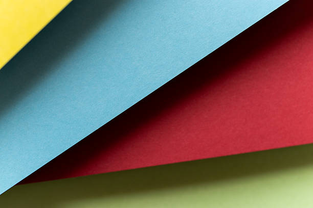 Overlapping light blue, red, yellow and green background