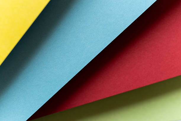 istock Overlapping light blue, red, yellow and green background 2220528249