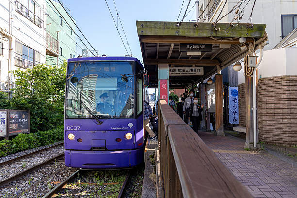 Tokyo, Japan - May 24, 2023 : People at the Koshinzuka Station in Tokyo, Japan. It is a station of Tokyo Sakura Tram.