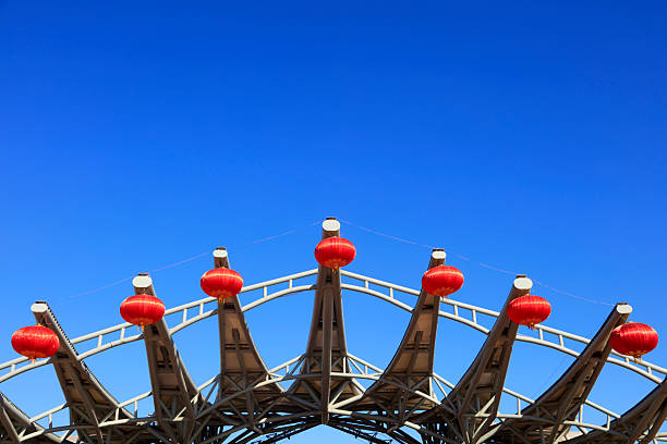 China, Beijing - September 22, 2025 : This image showcases the structural details of an ancient building at the Summer Palace. It contrasts intricate details against a cloudy sky.