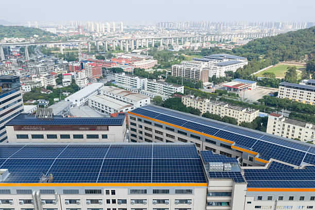 istock Solar photovoltaic power generation on factory roof 2220537607