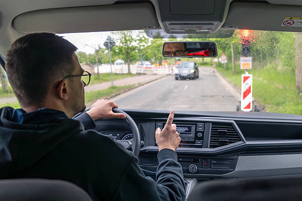 istock Driver waiting. Rainy city. Foggy windshield. 2220539297