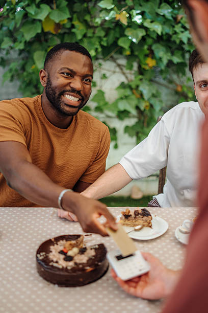 istock Friends eating lunch at a restaurant 2220540382