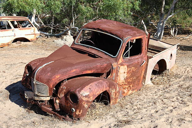 istock Vintage, old, rusty car abandoned in remote Australian Outback, amongst Eucalyptus trees. History, nostalgia, scrap, collection, travel and tourism 2220542650
