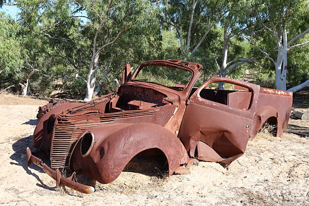 istock Vintage, old, rusty car abandoned in remote Australian Outback, amongst Eucalyptus trees. History, nostalgia, scrap, collection, travel and tourism 2220542653
