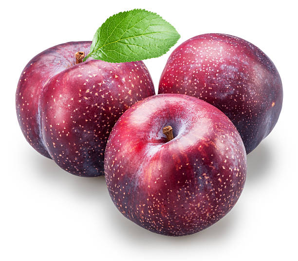 istock Ripe chinese plums with green leaf isolated on white background. File contains clipping paths. 2220542792