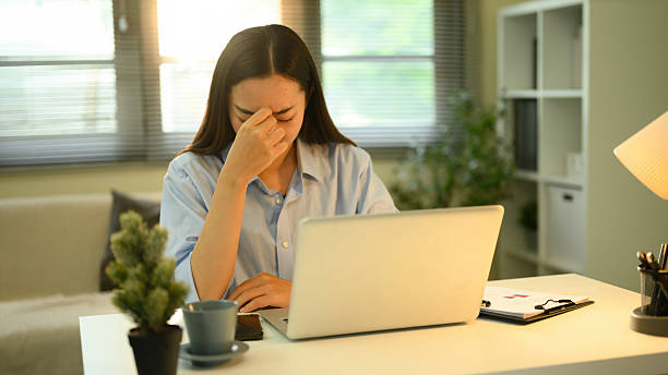 istock Stressed Businesswoman Facing Workload Challenges, Work Stress in a Home Office 2220552894