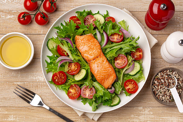 istock roasted salmon with vegetable salad 2220559852