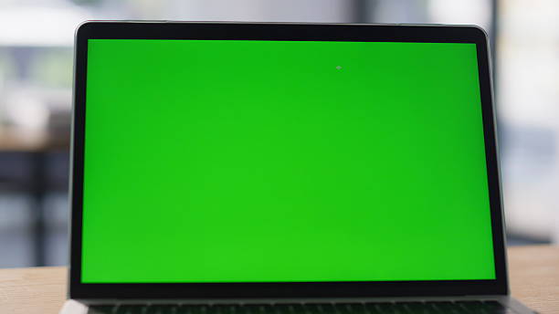 istock Modern green screen laptop displayed on work desk closeup. Chroma key computer 2220562484