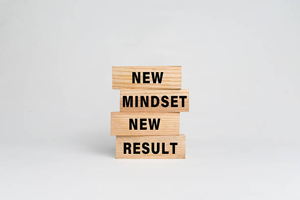 istock new mindset new result words text on wooden blocks isolated on white background 2220563143