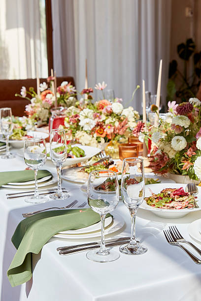 istock Restaurant autumn aesthetic table setting, flowers arrangement under sunlight shadows 2220568374
