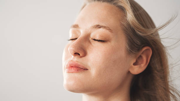 istock Woman face close up view 2220570672