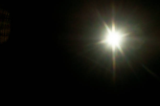 Sun flare on the black background