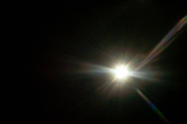 istock Sun flare on the black background 2220572706