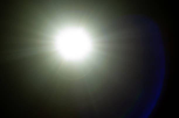 istock Sun flare on the black background 2220572734