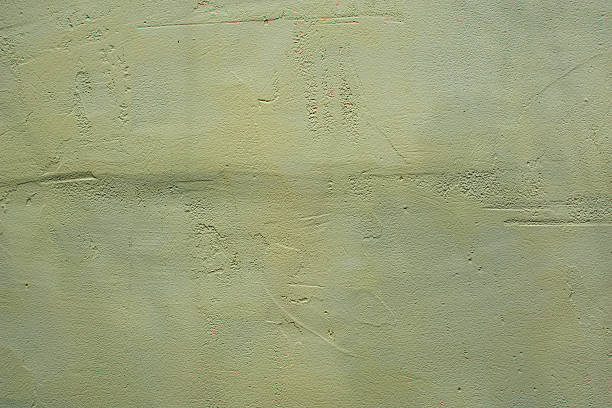 istock The background is a beige wall covered with paint 2220573144