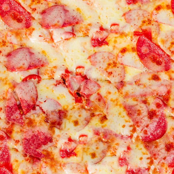 istock Seamless 4k photo texture of pepperoni pizza. 2220576873