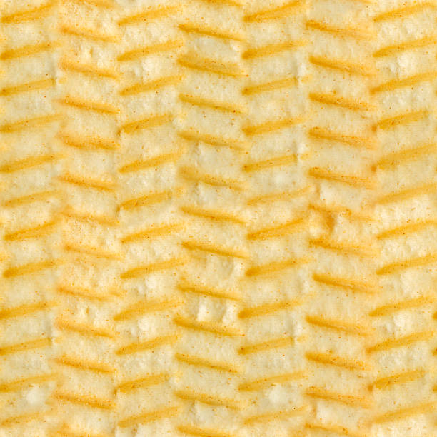 Seamless 4k photo texture of baked cookie patterned surface.