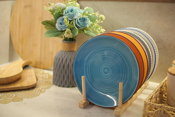 istock Decorative plates and flowers arranged in a cozy kitchen setting 2220577329