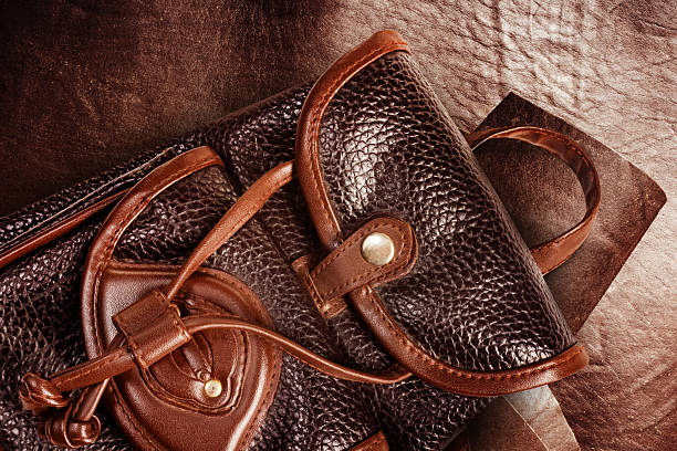istock Photo of leather backpack on leather roll background. 2220577454