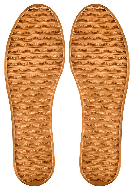 istock Isolated photo of brown colored rubber shoe protector on white background. 2220578251