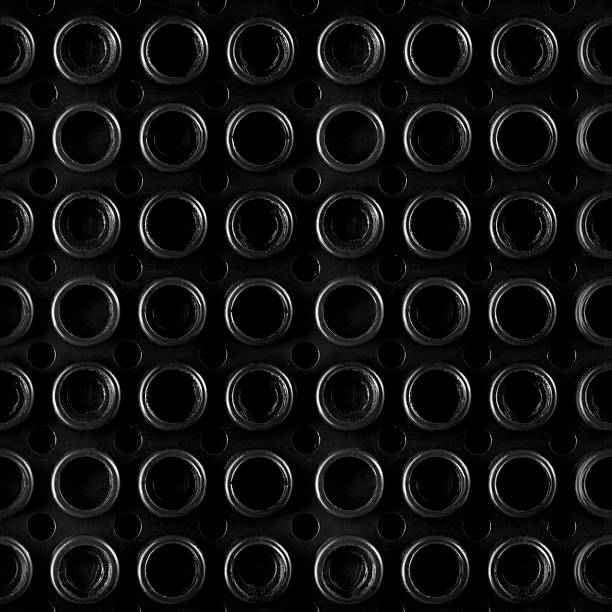 istock Seamless 4k photo texture material of black plastic construction blocks toy surface. 2220580210