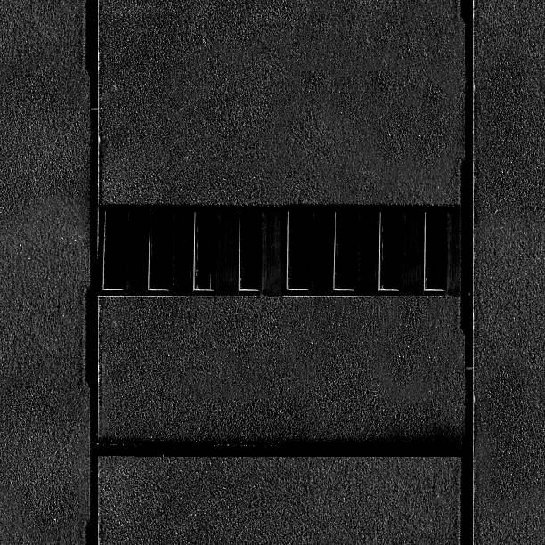 istock Seamless 4k photo texture material of black plastic tech panel surface with ventilation holes. 2220580574